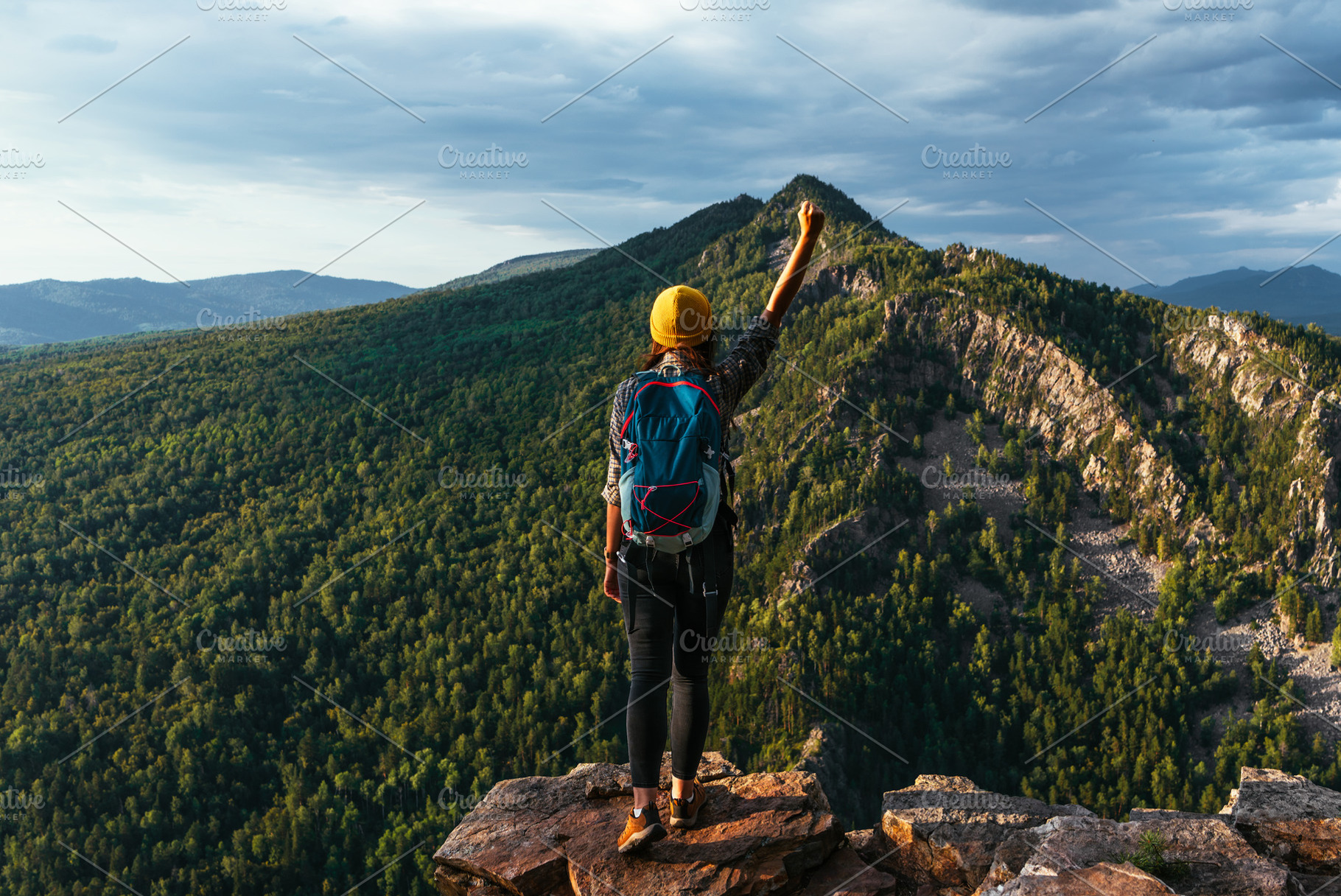 The man on the top of the mountain, a Person Photo by SOTNIKOV_MISHA