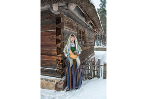Latvian woman in traditional dress, a Person Photo by COLORFUL