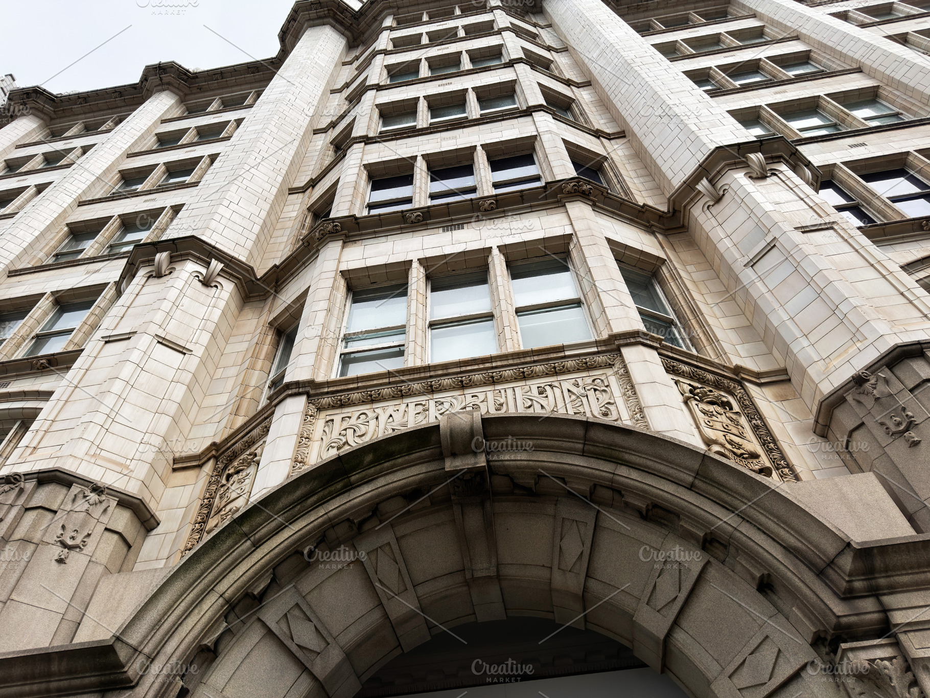 Ornate historic building facade in Liverpool, UK with arched ent, a Photo by AS photostudio