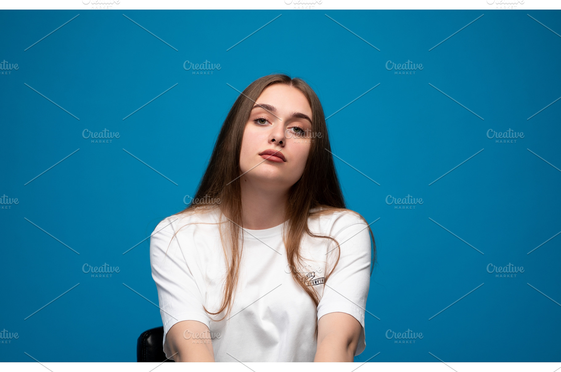 Young serious woman looking at, a Person Photo by volodymyrshtun13795