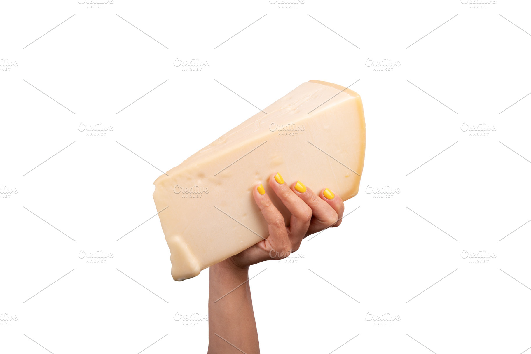 Close-up of a female hand with yellow nails holding a large wed, a Food & Drink Photo by Ales Munt