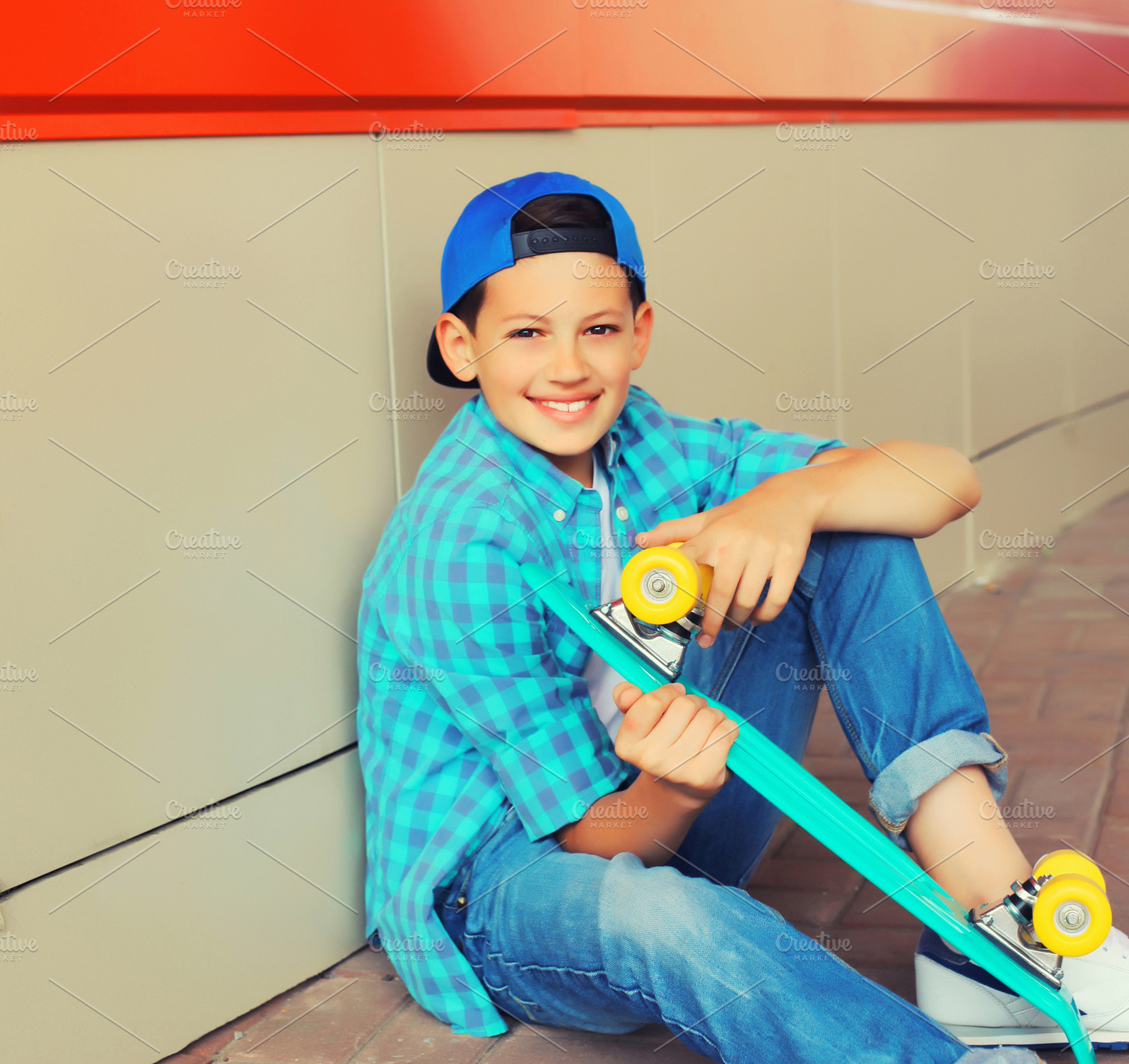 Happy smiling teenager boy with skat, a Person Photo by Rohappy