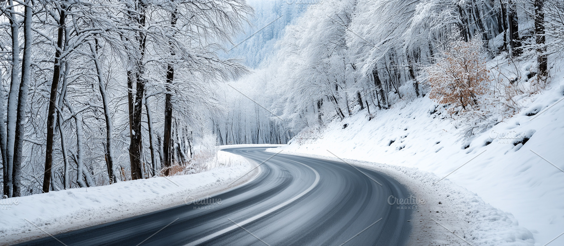 Winding road surrounded by snow, a Nature Photo by MistyDay