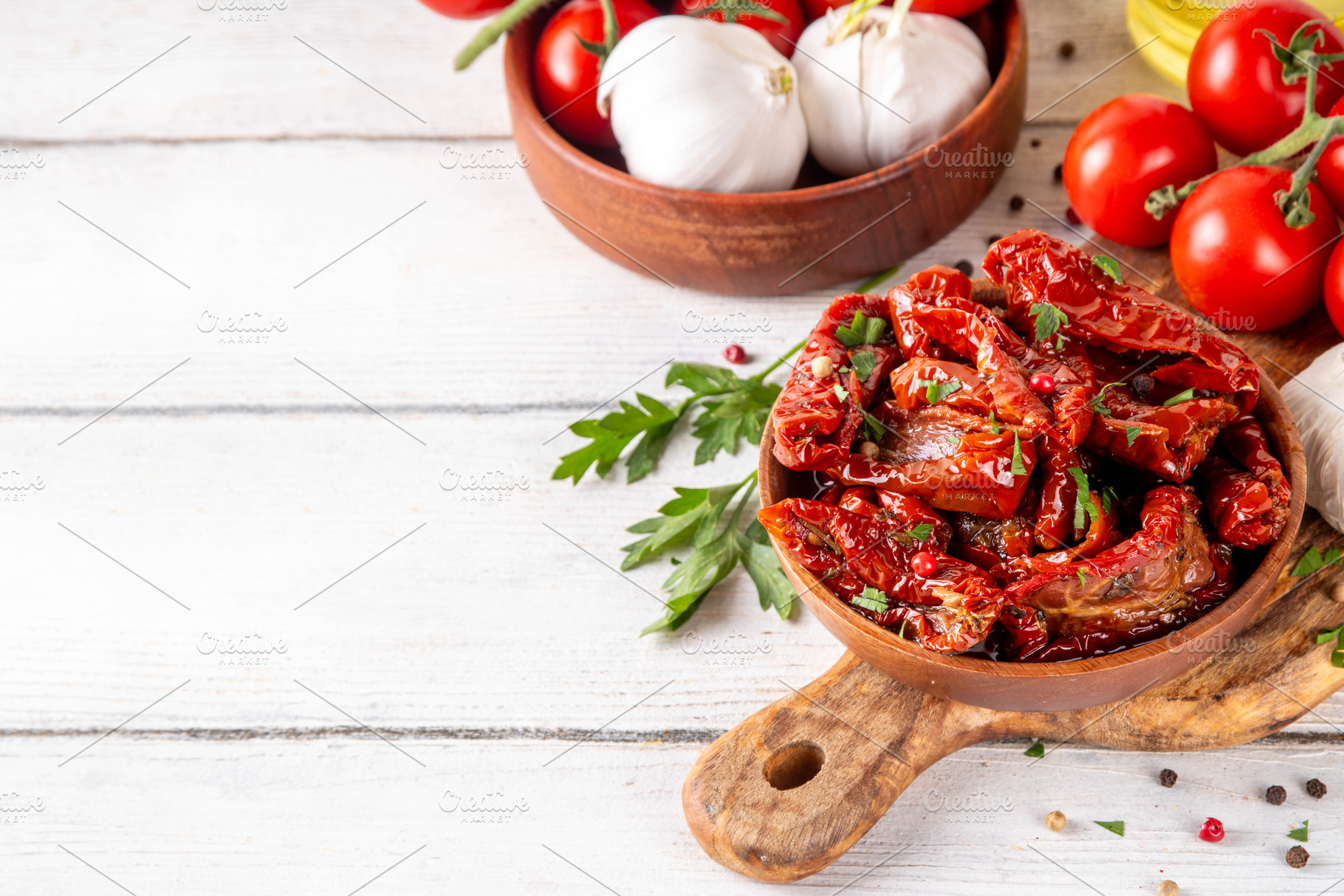 Homemade sun-dried tomatoes in olive oil, a Food & Drink Photo by Rimma