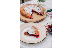 Slice of cherry pie with, a Food & Drink Photo by Jan Jack Russo Media