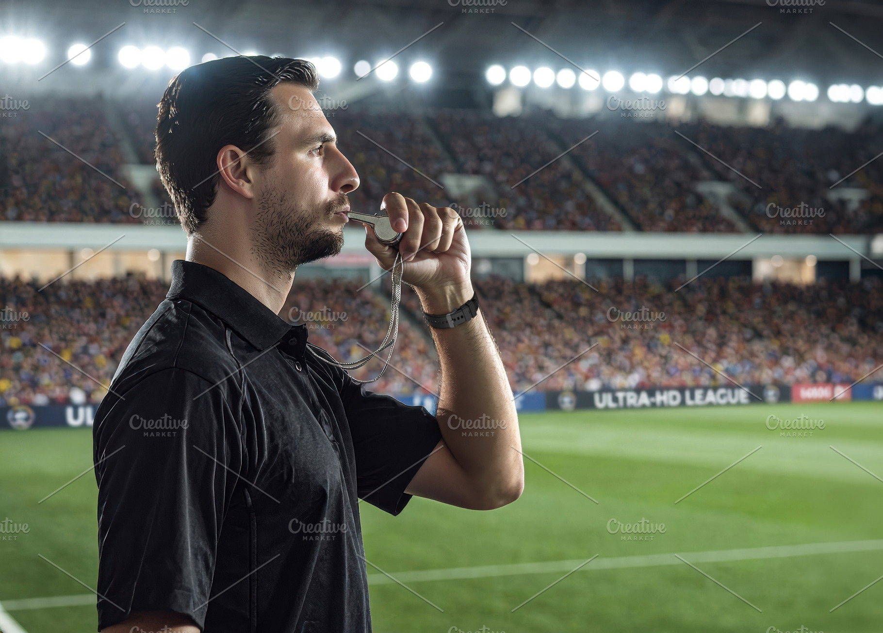 Soccer Referee Blowing Whistle in Stadium, a Sports & Recreation Photo by Davizro's Market