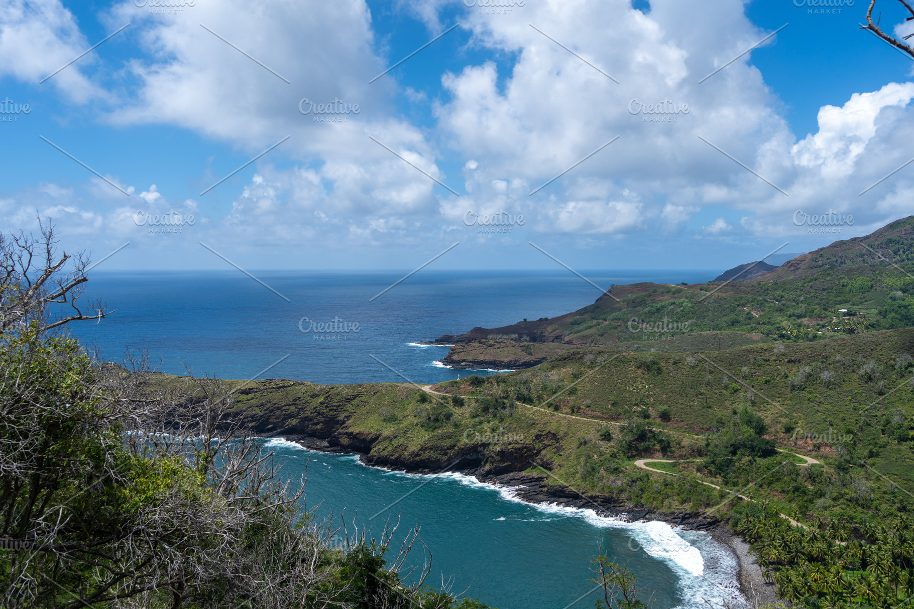 Coastal cliffs and turquoise bay near Puamau, Hiva Oa, Marquesas, a Nature Photo by GoodGoods