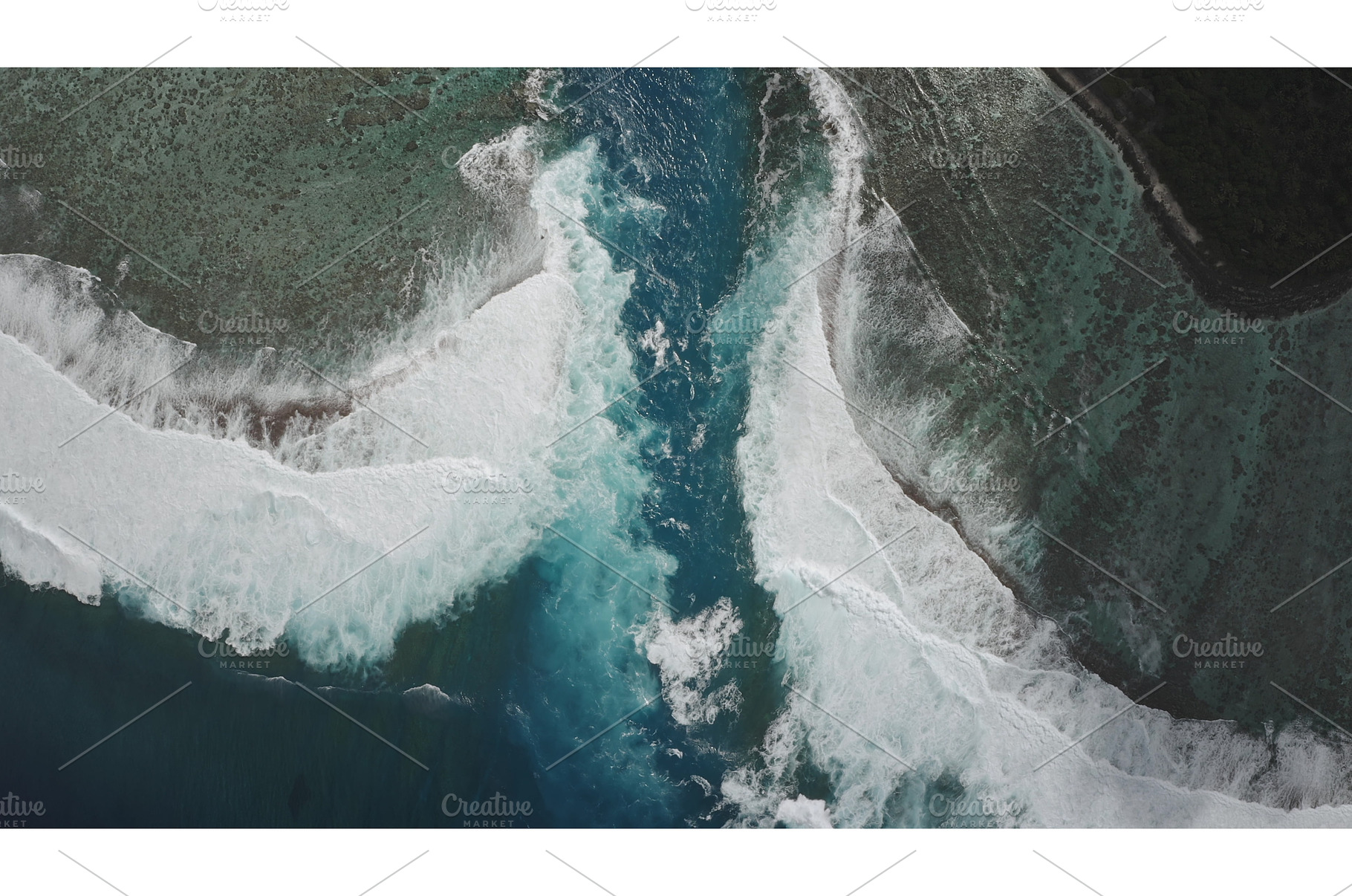 Turquoise water flowing between two, a Nature Photo by Goinyk