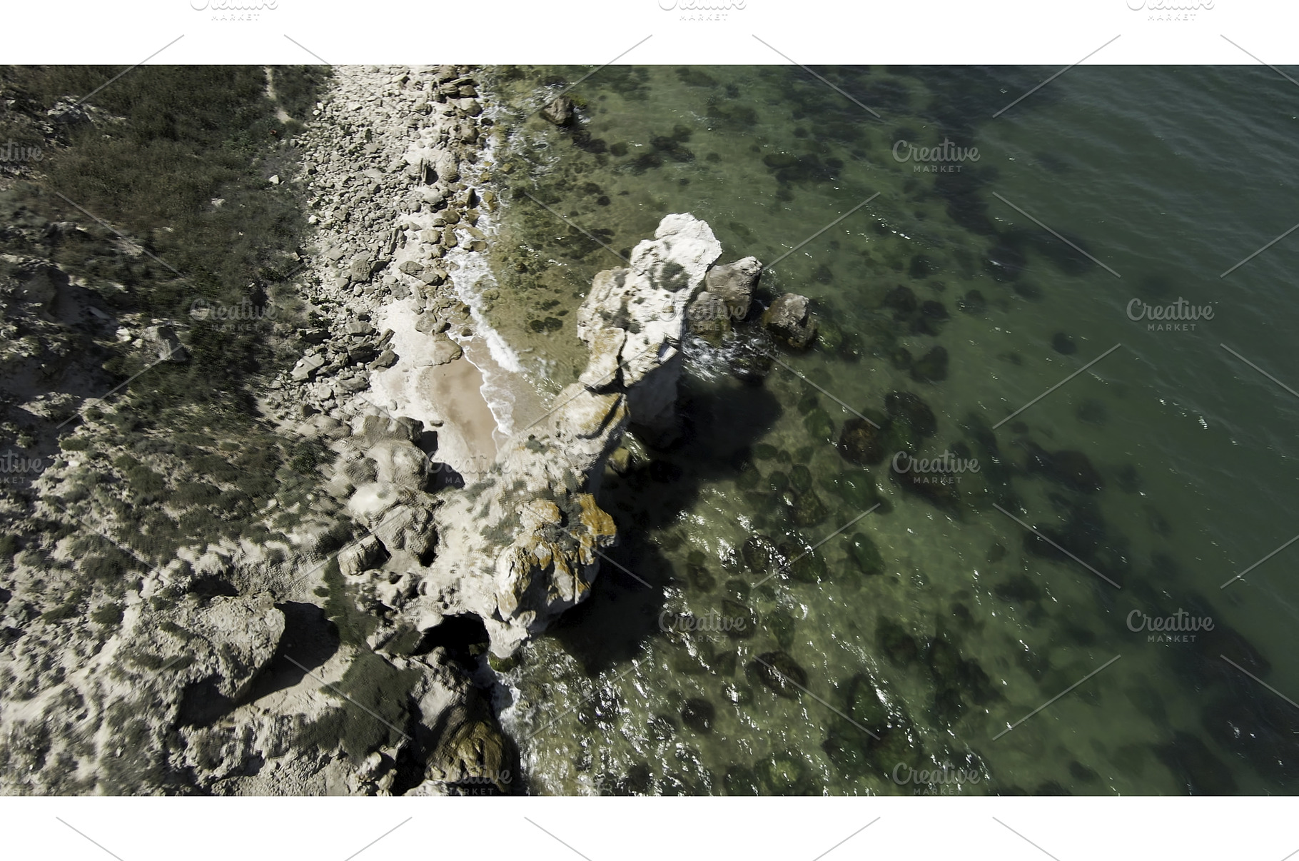 Top view of beautiful stone shore, a Nature Photo by Media Whale Stock