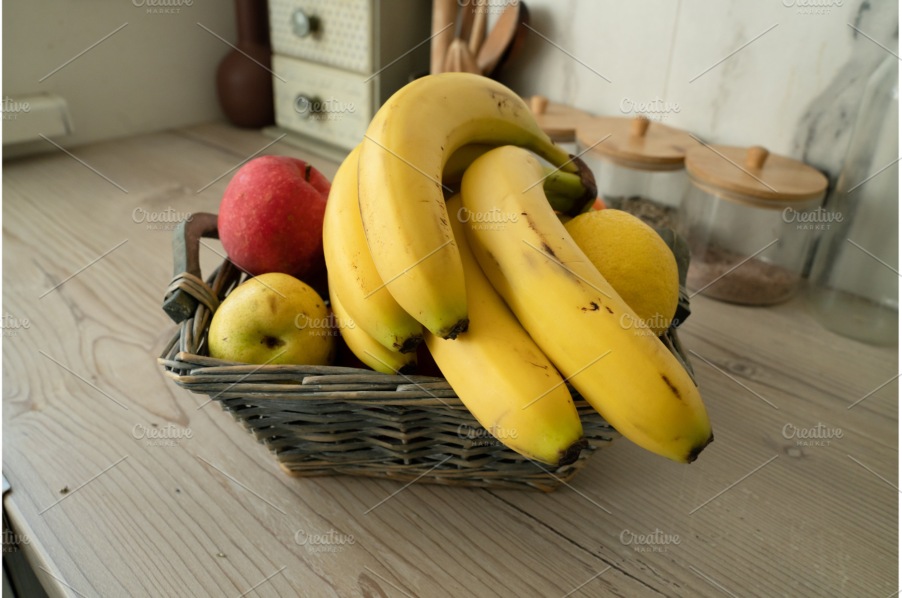 Basket with fresh fruits on table in, a Food & Drink Photo by oksix