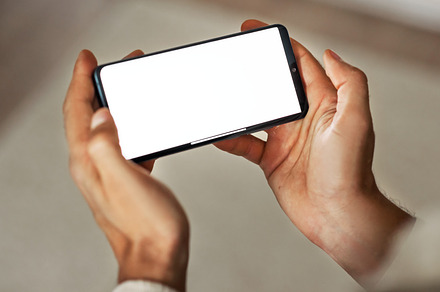 Mockup of man's hands holding phone