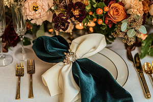 Elegant royal dining table adorned with luxurious floral arrange, a Holiday Photo by Studio ANNA