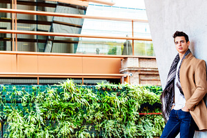 Stylish young man in coat and scarf outdoors, a Person Photo by RF Images