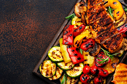 Grilled chicken and vegetables. Bbq party. Colorful paprika, zuc, a Food & Drink Photo by 5PH