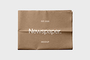 Newspaper Mockup, a Books & Magazine Mockup by Design Squad (Thumbnail 2 of 5)