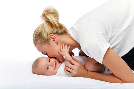Beautiful young mother with toddler featuring small, white, and female