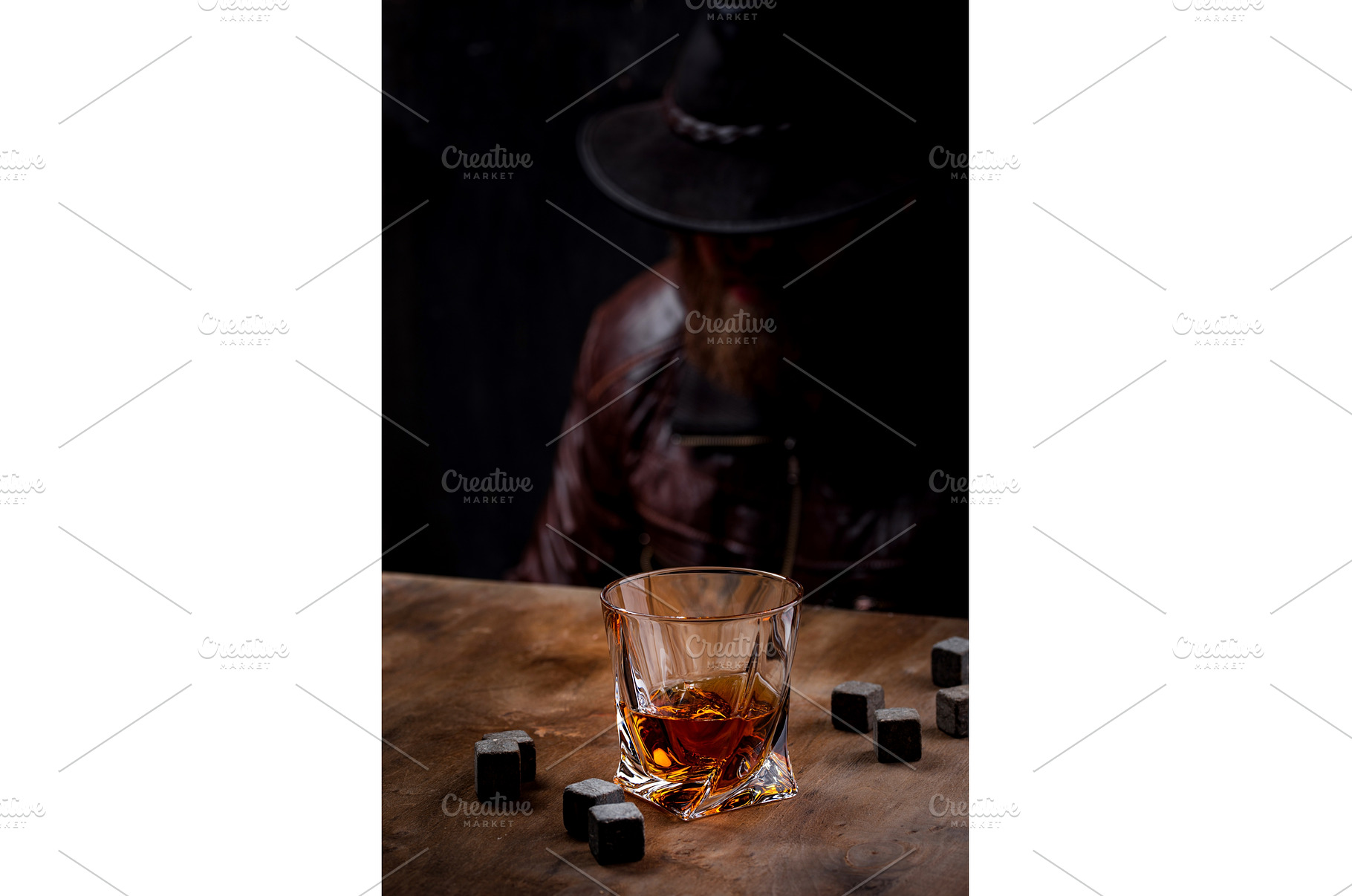 Glass of whiskey and stones, a Food & Drink Photo by Yulia Furman