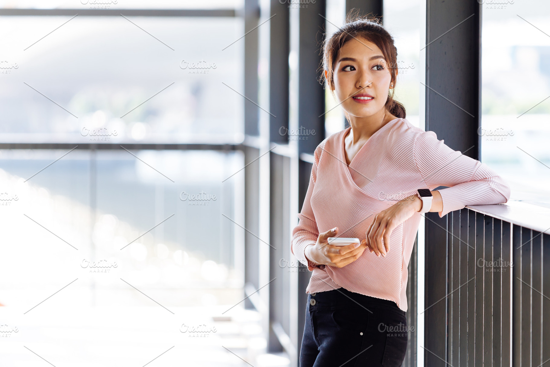 Asian woman leaning on handle stock photo containing woman and asian, a Person Photo by Twinster Photo