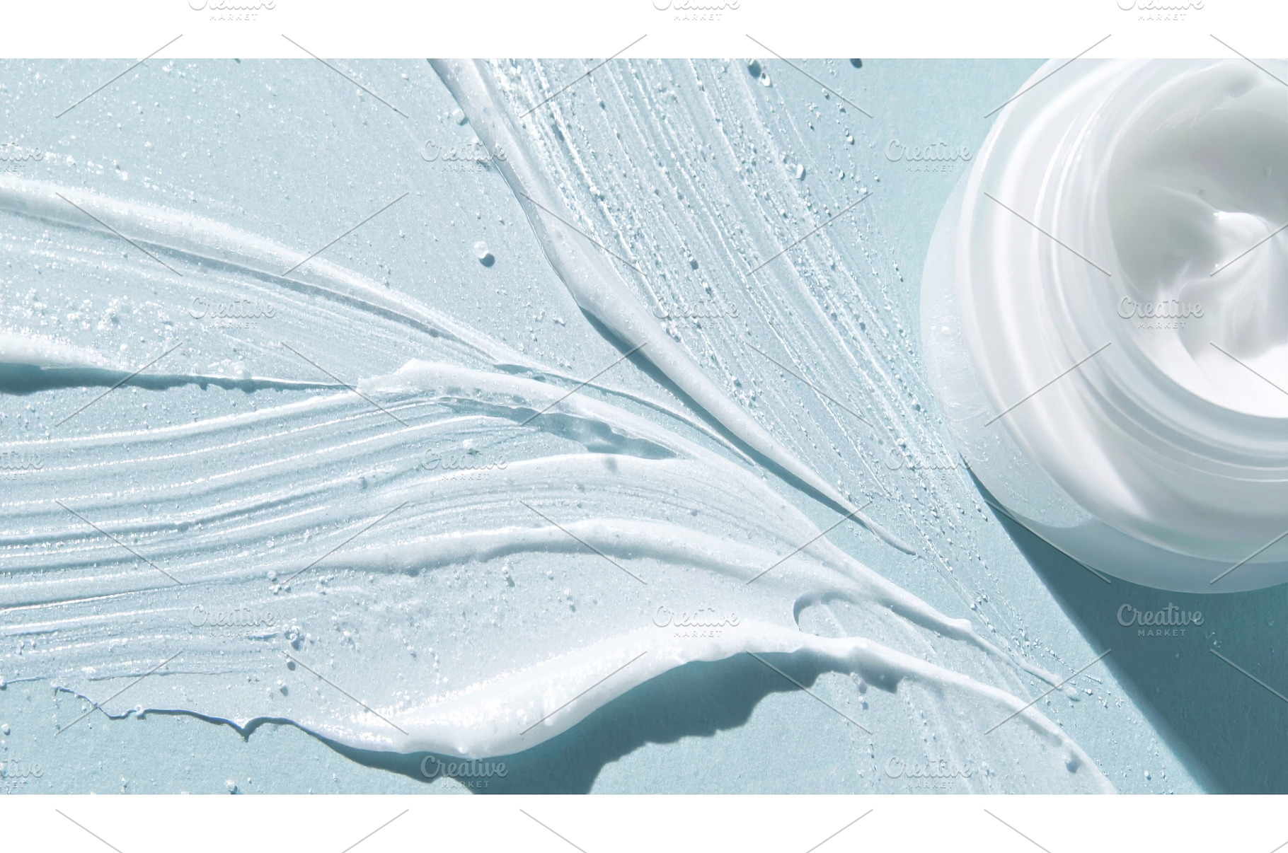 Flat lay of white skincare cream, a Beauty & Fashion Photo by Igor Tichonow