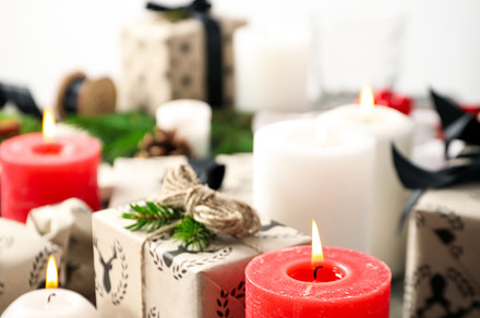 Concept of Happy New Year, gift boxes and candles, blurred backg, an Arts & Entertainment Photo by AtlasStudio PRO