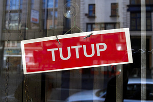 closed sign in Indonesian, a Photo by WorldOfPhotos