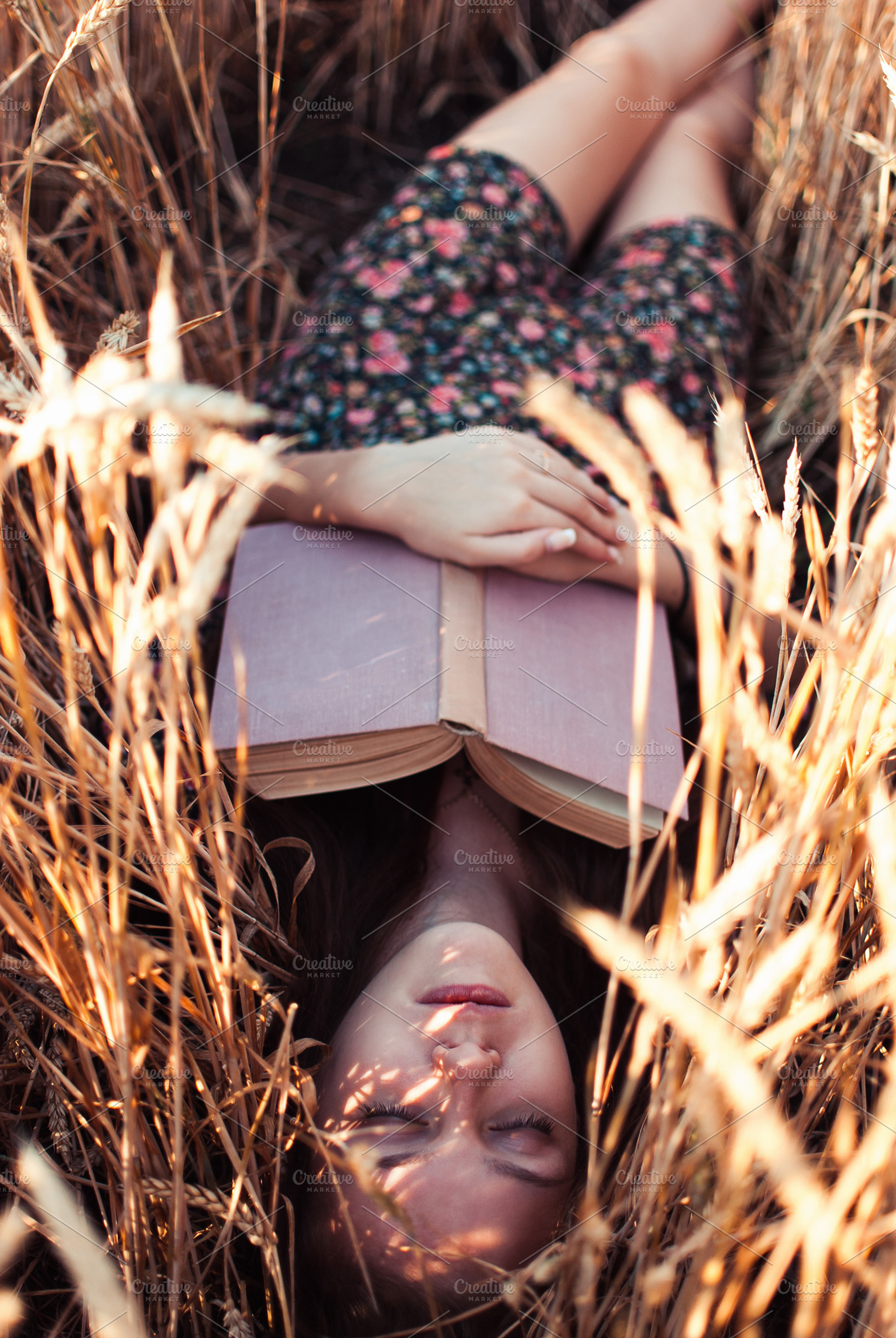 Dreaming with book, a Person Photo by maxsokal