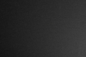 Dark grey matte paper surface