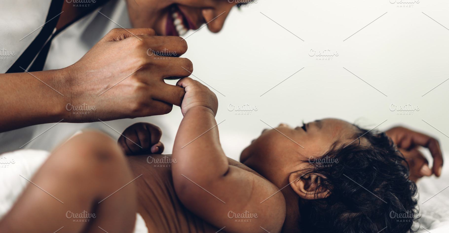 Portrait of enjoy happy love family african american mother play, a Person Photo by Art_Photo