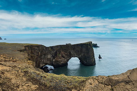 Picturesque autumn evening view to Dyrholaey coast cliffs and ro, a Nature Photo by YuriyB