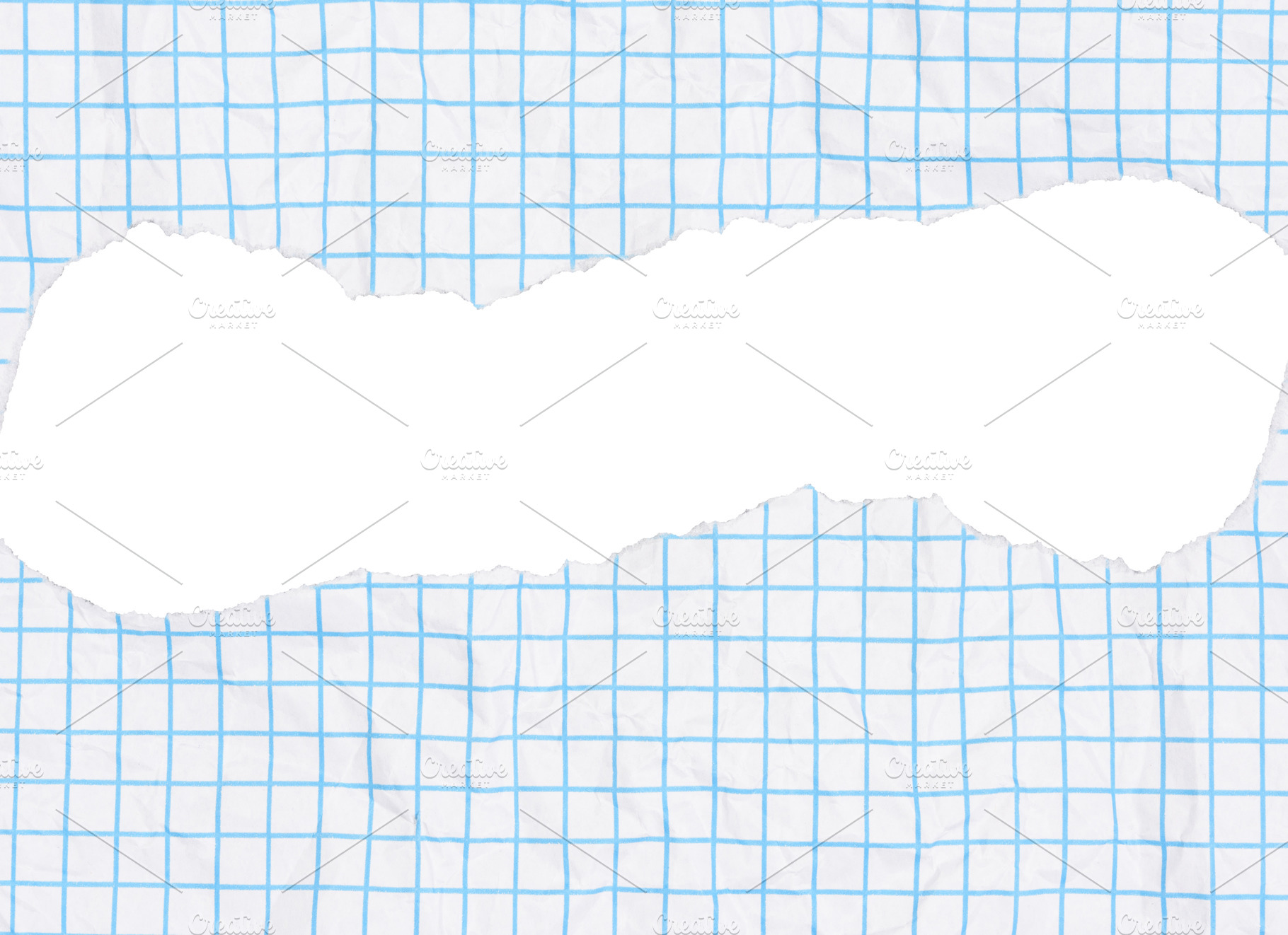 Piece of paper with a light blue grid pattern and a large, torn, a Background Photo by ndanko