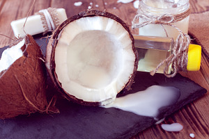 Coconut products for hair care containing background, body, and bottle