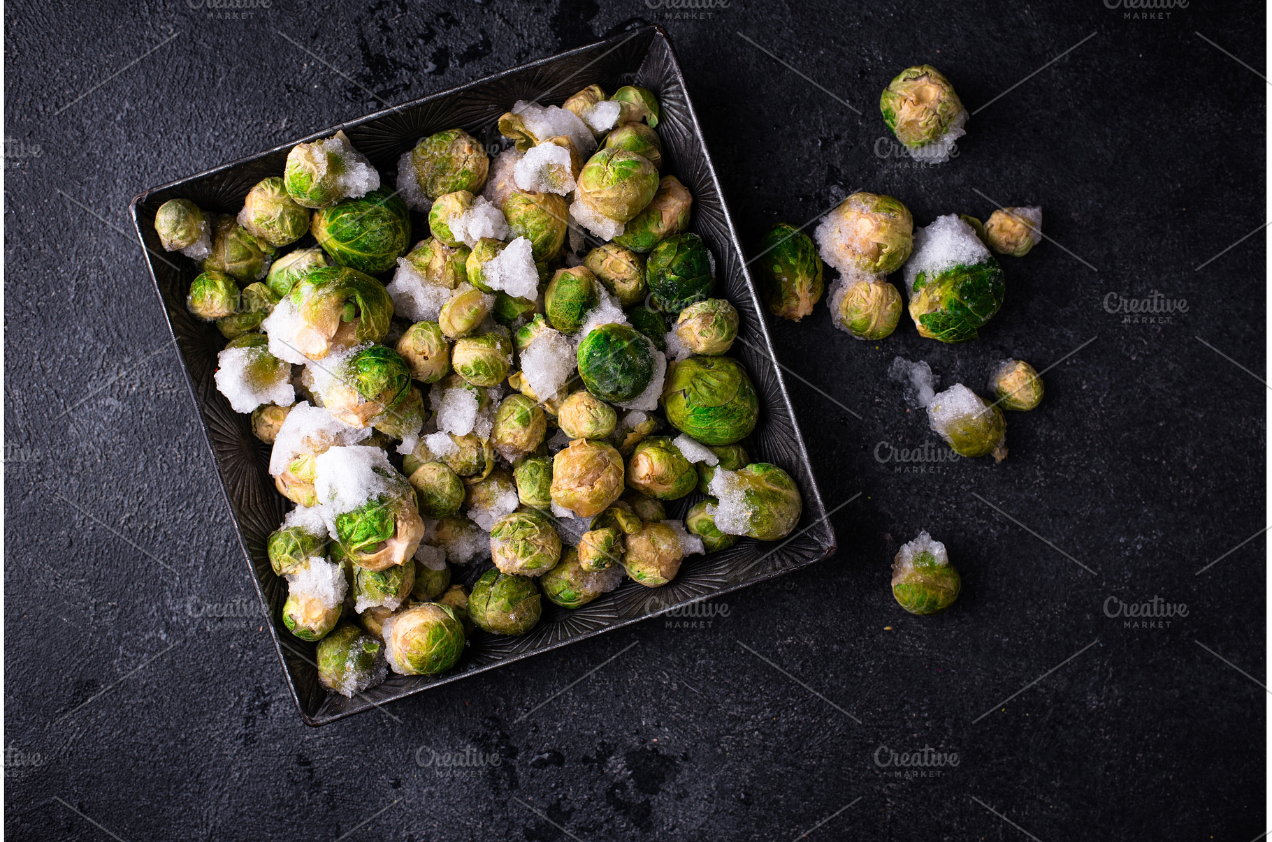 Frozen Brussels sprouts on dark, a Food & Drink Photo by Yulia Furman