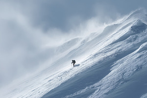 Climber on snowy slope, a Photo by Beautiful things