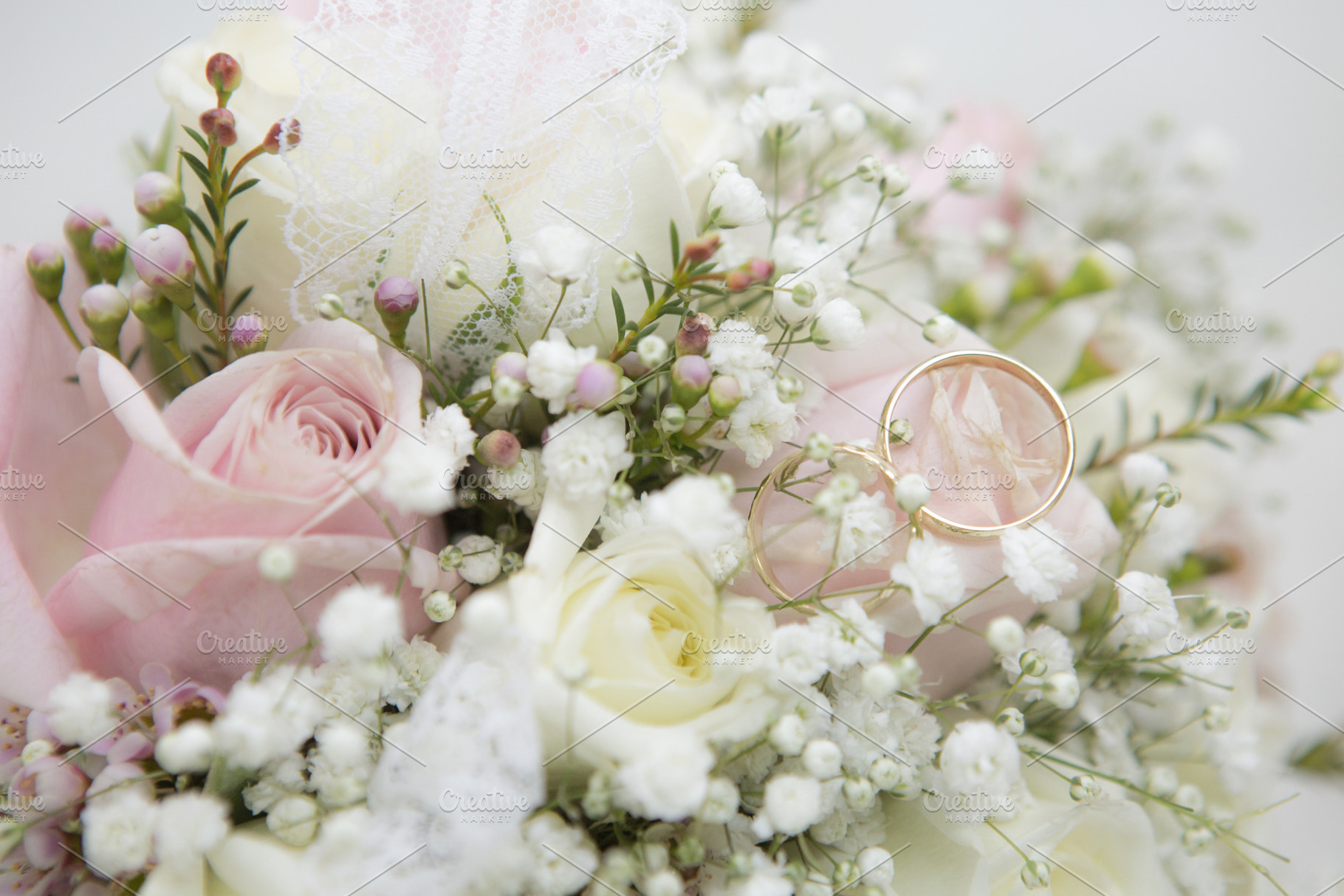 Wedding rings and bouquet, a Wallpaper Photo by Photo Kaminski