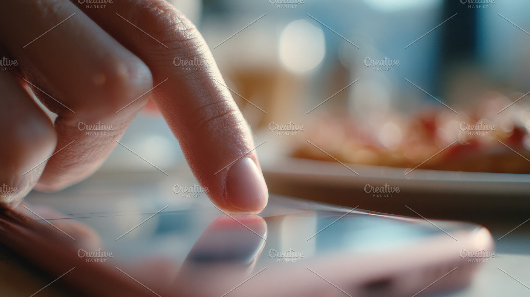 Using a smartphone in a cafe, a Photo by Beautiful things