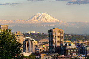 The seattle skyline with a prominent containing america, architecture, and