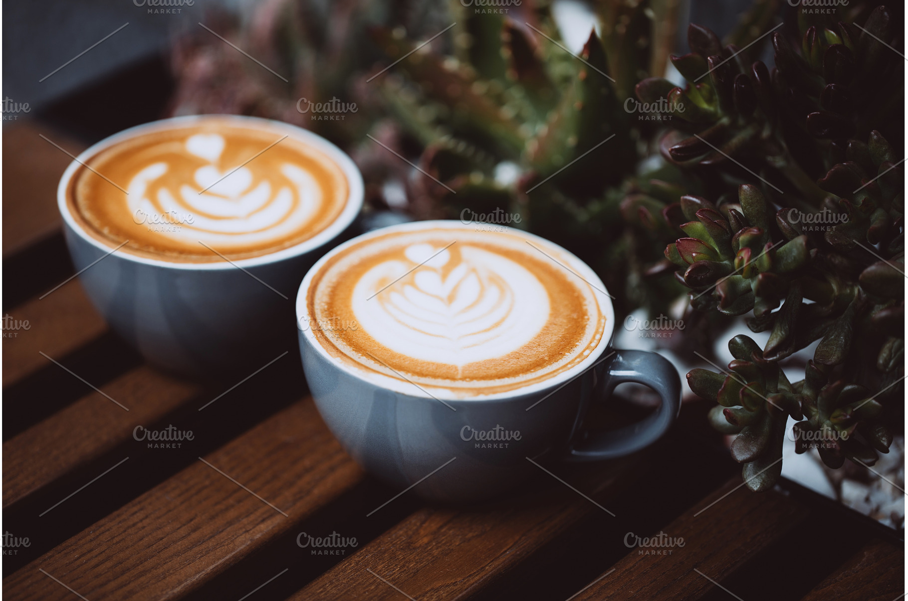 Two cups of cappuccino, a Food & Drink Photo by Anna Efetova