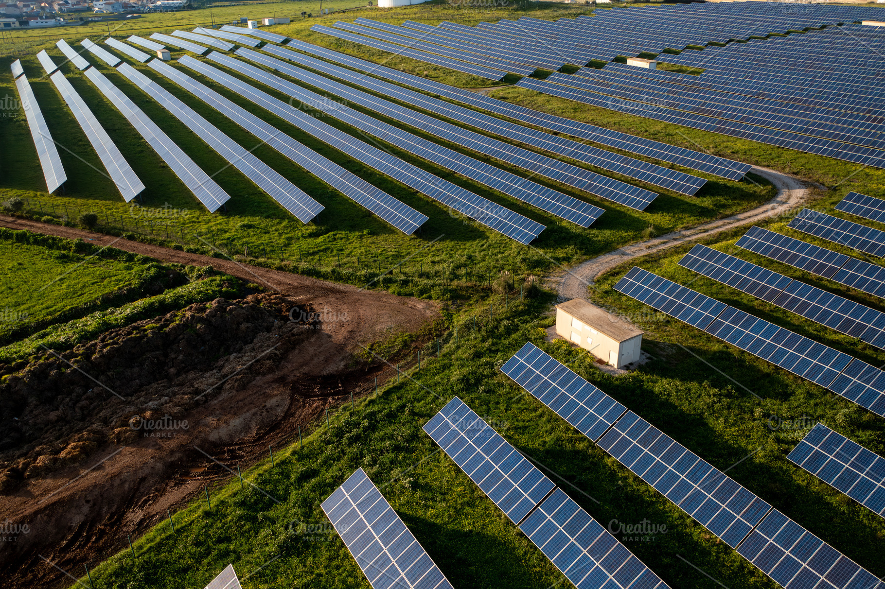 Vast solar panel field showcasing renewable energy generation in a rural landsc, a Photo by andreonegin market