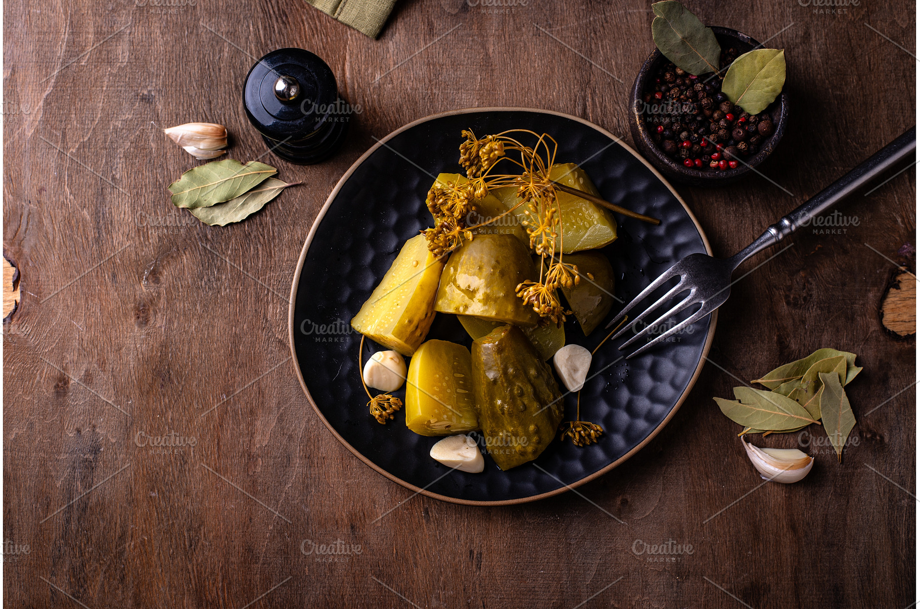 Bowl of pickled marinated cucumbers, a Food & Drink Photo by Yulia Furman