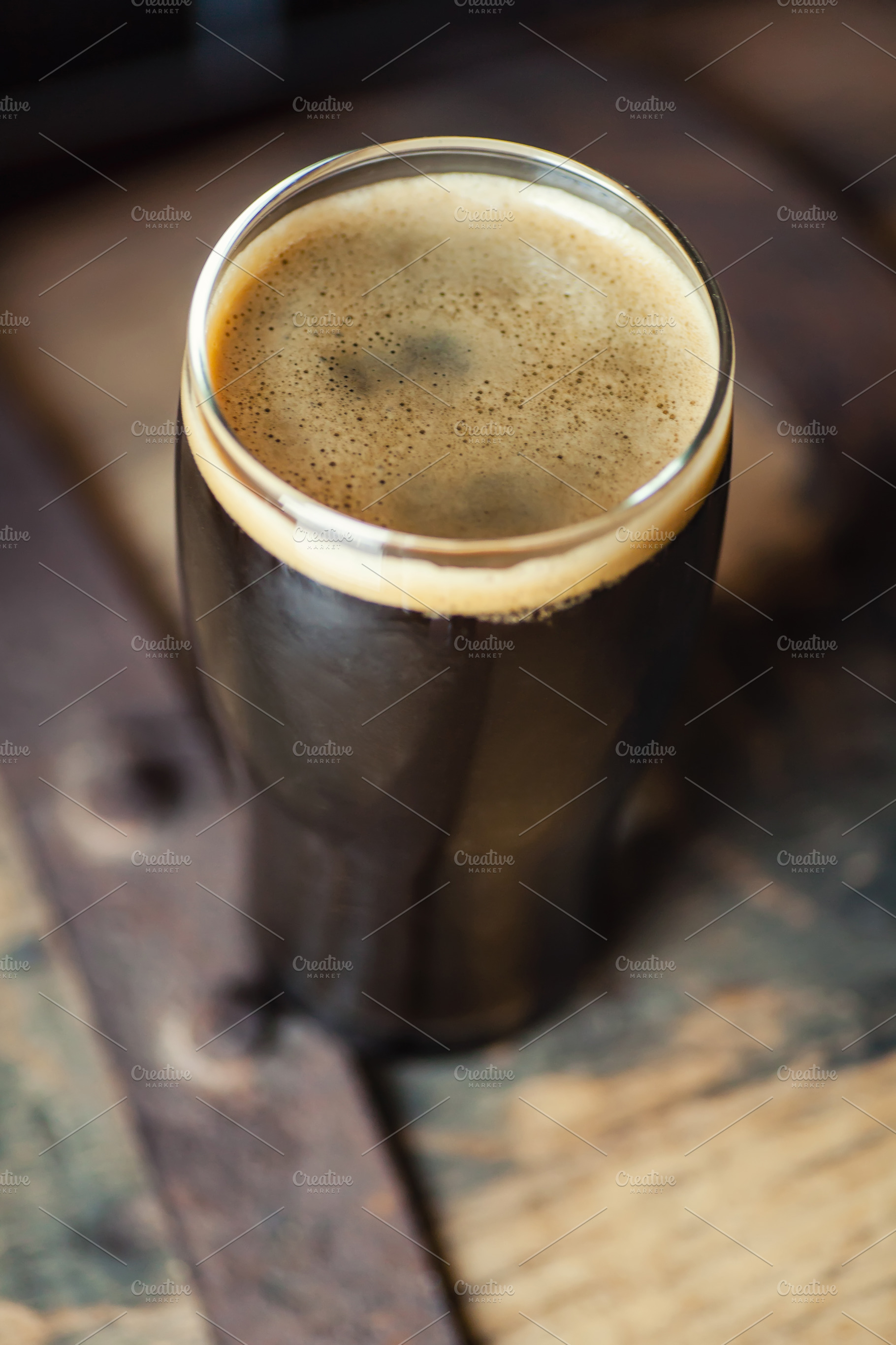 Pint of Stout on a Barrel, a Food & Drink Photo by Hidden Hallow