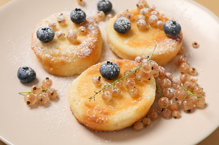 Concept of tasty sweet food, cheese pancakes, close up, a Food & Drink Photo by AtlasStudio PRO