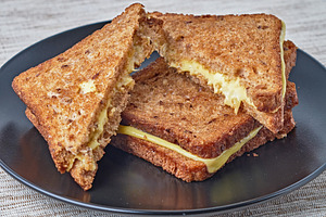 Grilled sandwich with cheese containing cheese, grilled, and sandwich
