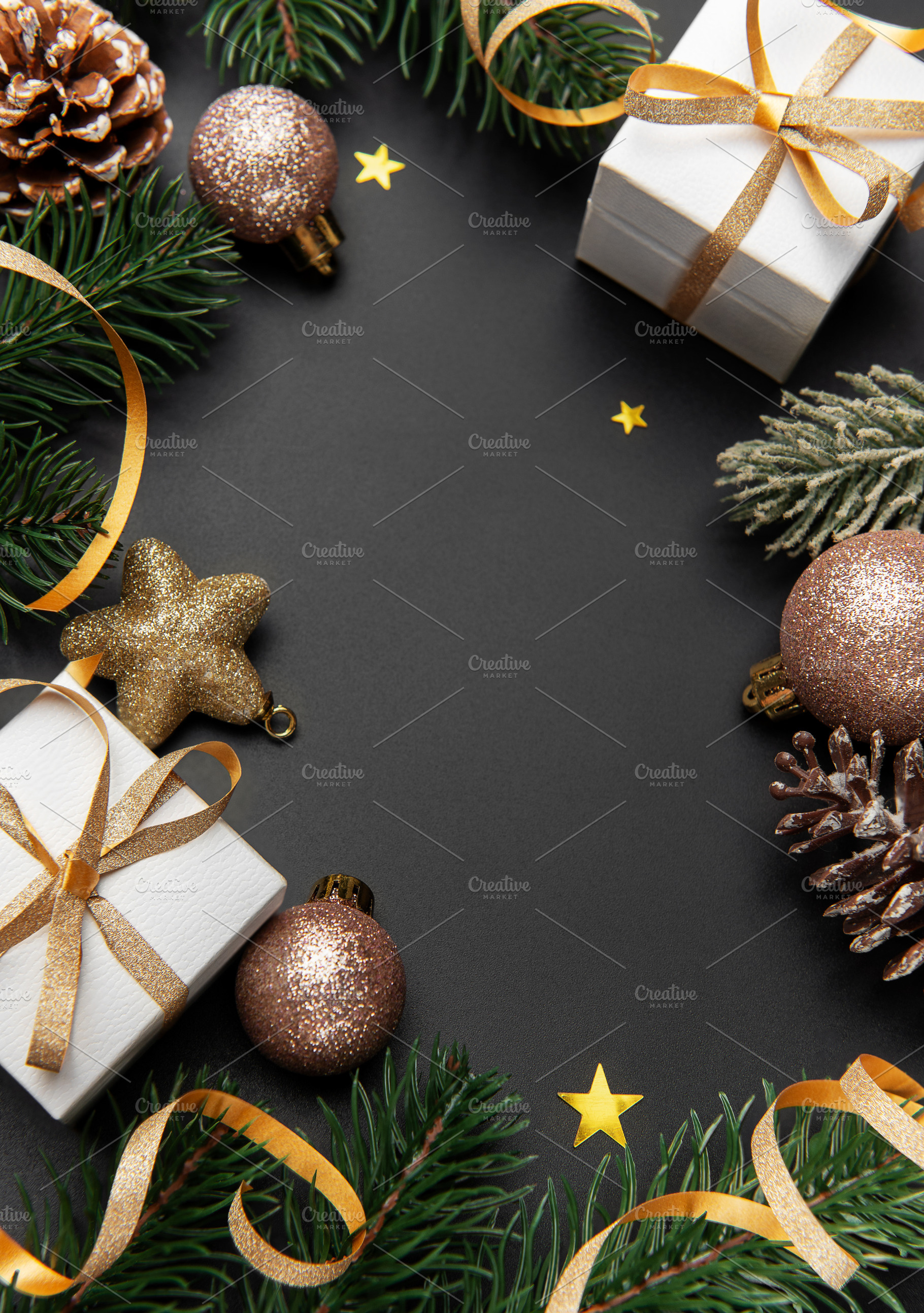 Christmas gifts and decorations forming dark background frame, a Holiday Photo by Olena Rudo