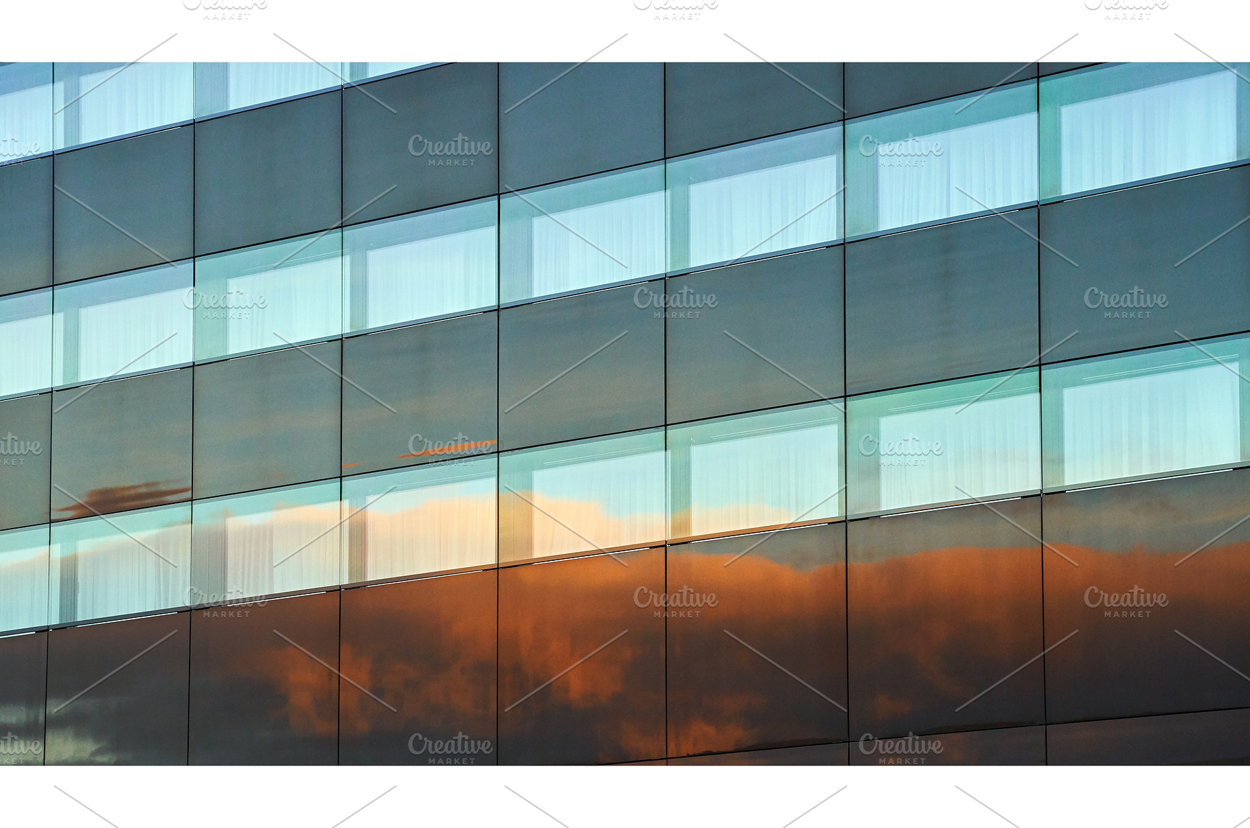 Evening clouds reflected in the, an Architecture Photo by Oleksandr Berezko