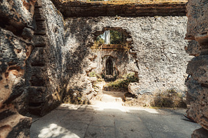Ancient ruin with arched windows, an Architecture Photo by SkyNext