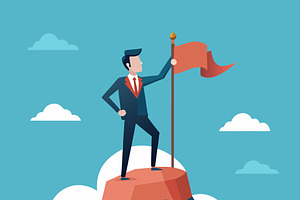 Businessman standing on mountain