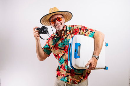 Smiling man ready for tropical vacation adventure