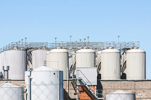 Industrial plant and storage tanks, an Industrial Photo by BOOCYS