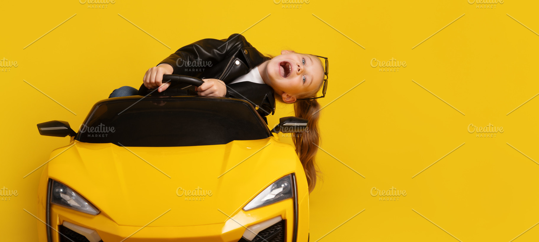 Young girl in black leather jacket leaning to the side and laugh, a Person Photo by Ales Munt
