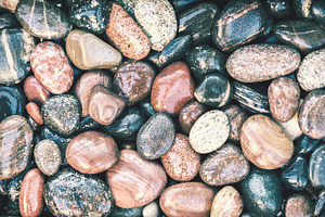 Colorful wet pebbles background, a Nature Photo by BOOCYS